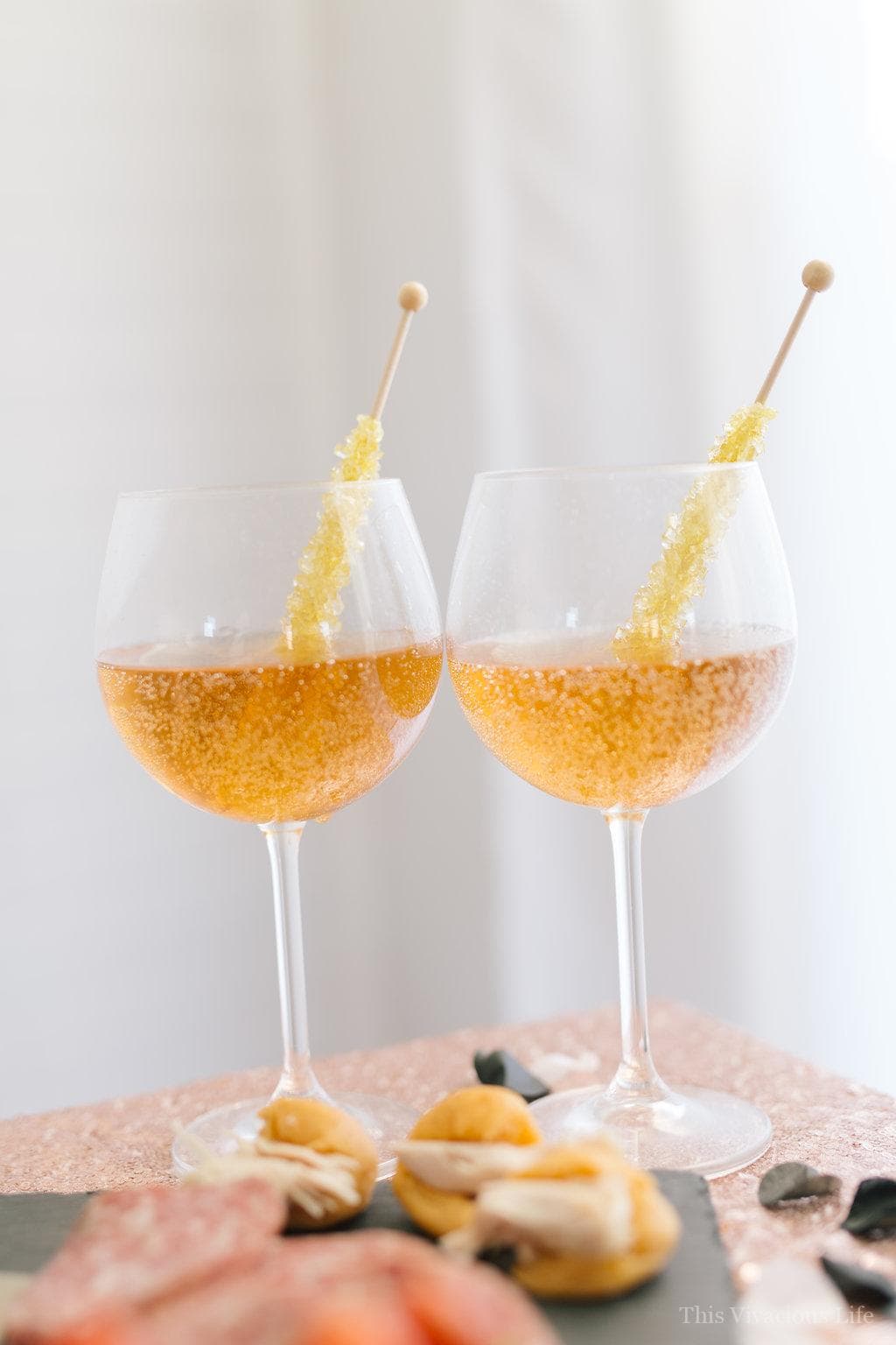 virgin drinks in wine glass with rock candy