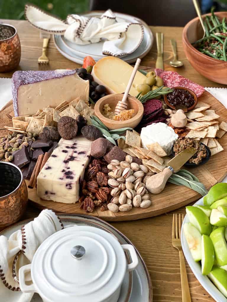 Charcuterie board with cheese, meat and olives