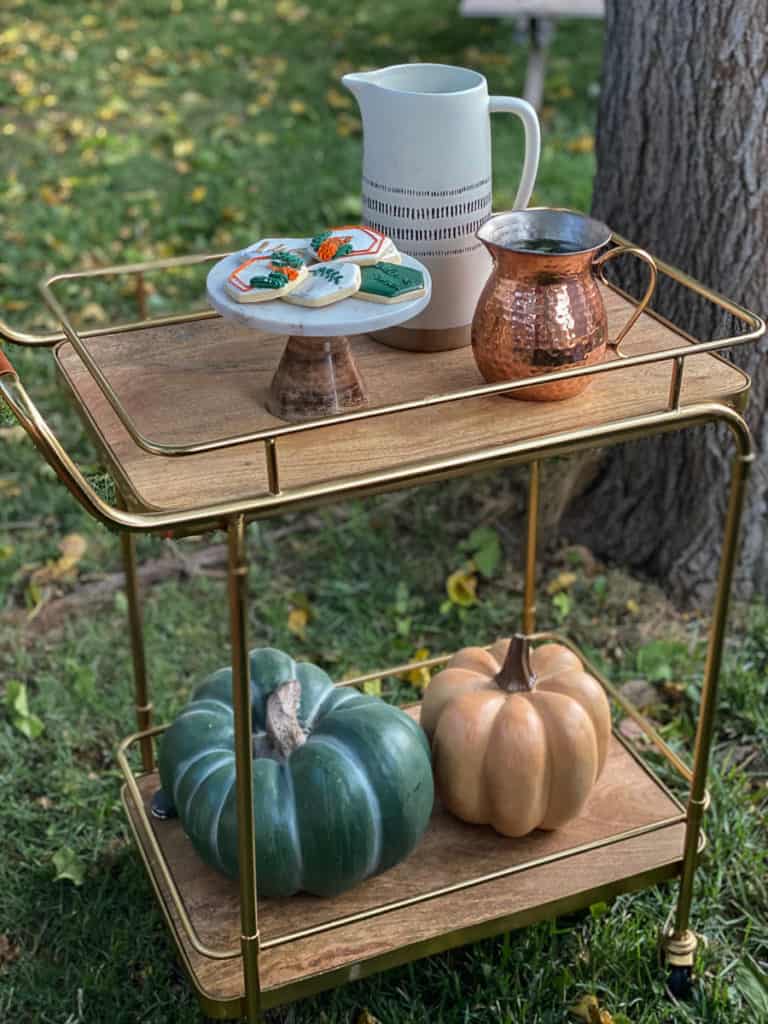 Bar cart with cookies, pumpkins and pitchers