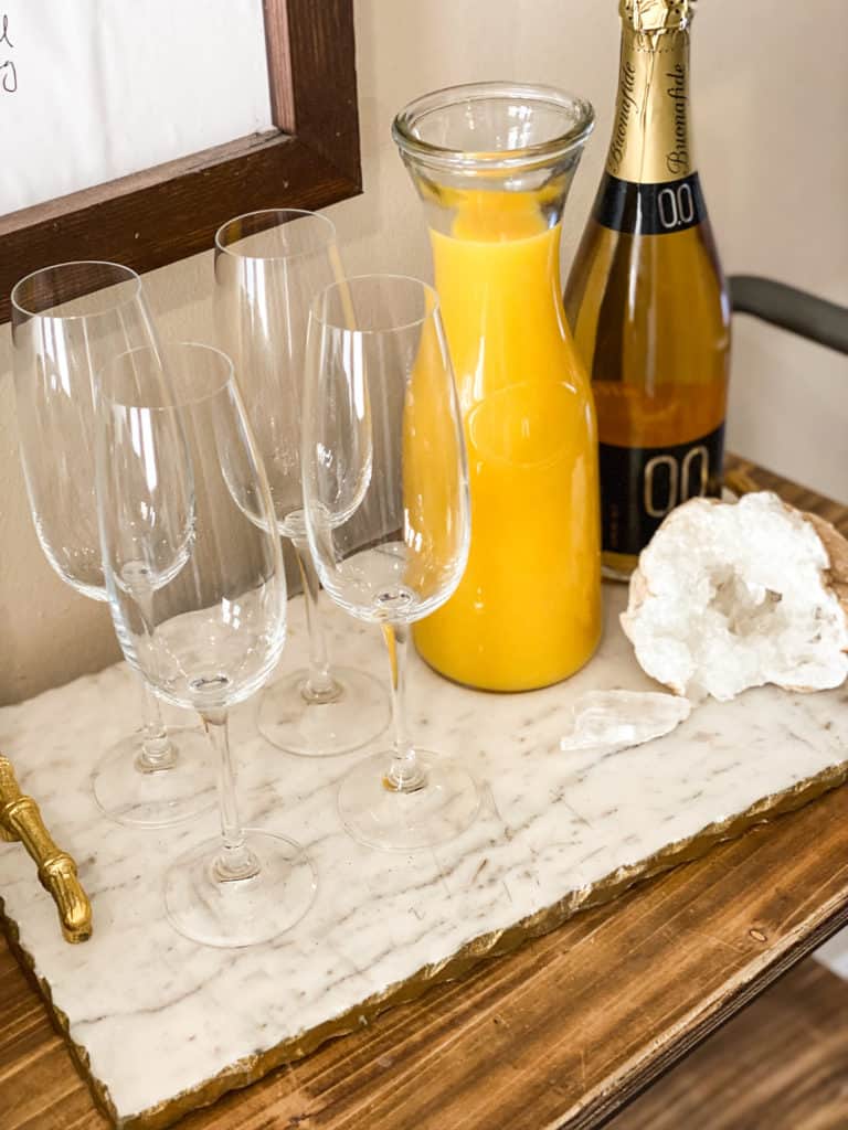 Champagne glasses with orange juice 