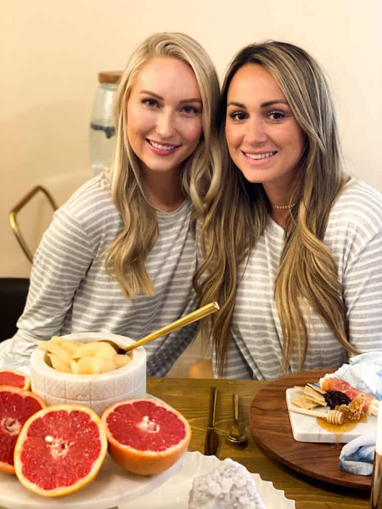 Two girls with brunch and matching pjs