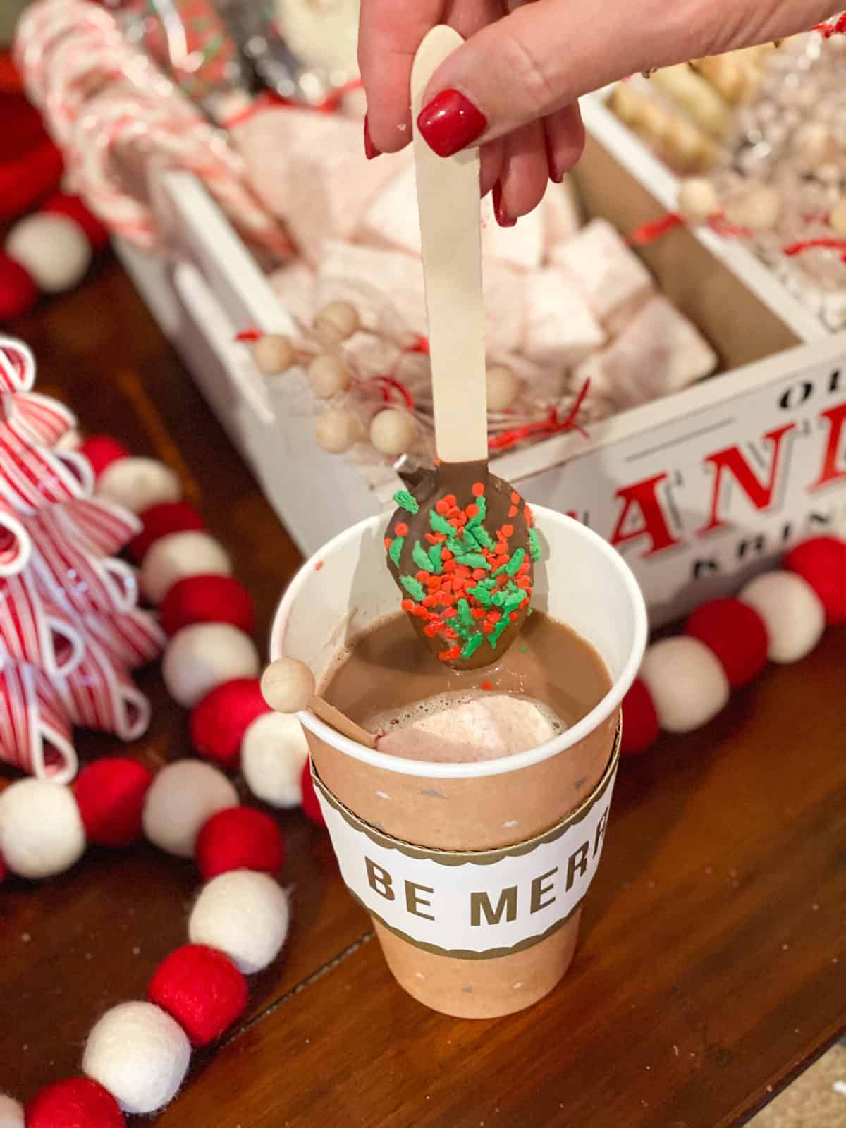 Hot Cocoa Bar with chocolate spoon in cup