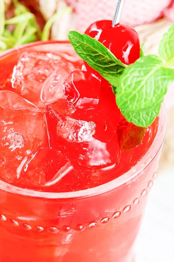 Red Shirley Temple mocktail in a glass