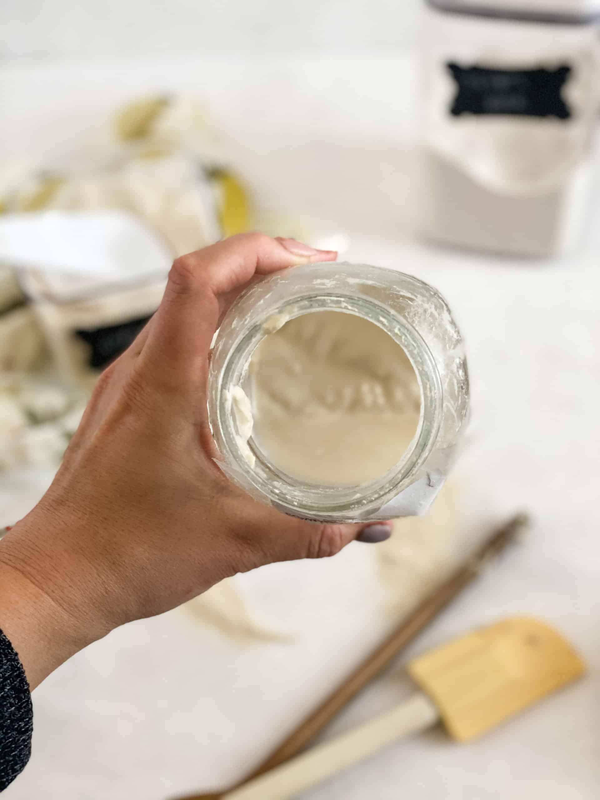 Jar of gluten-free sourdough starter with hooch