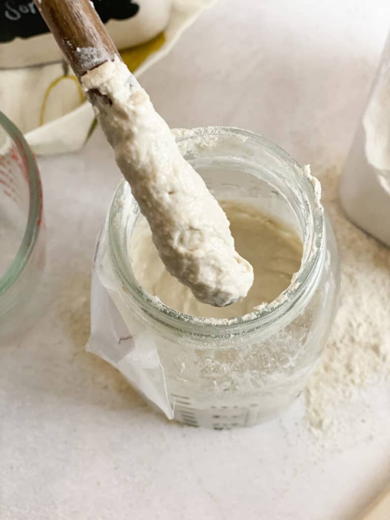 Texture of gluten-free sourdough starter in a jar