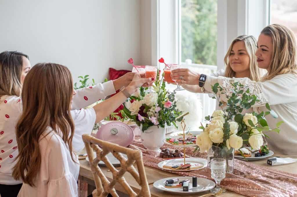 Girls toasting Valentines Mocktails