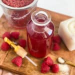 Raspberry Simple Syrup in a glass bottle