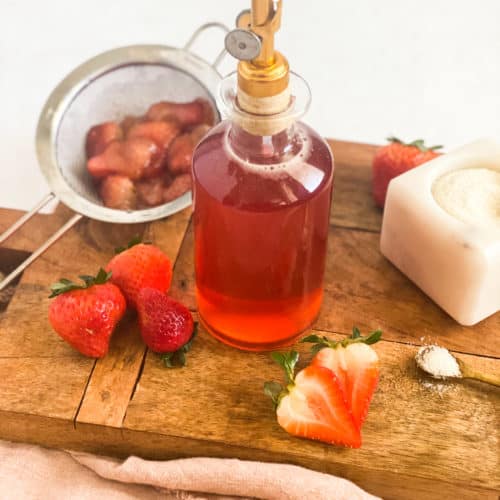 Strawberry Simple Syrup in a glass jar