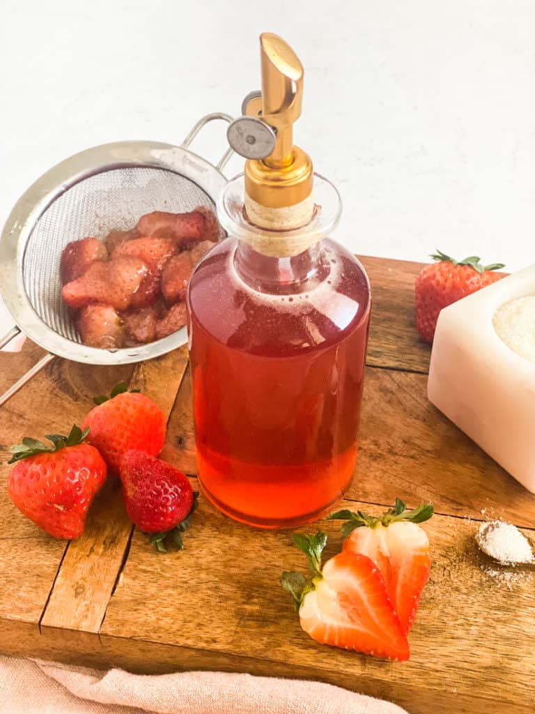 Strawberry Simple Syrup in a glass jar