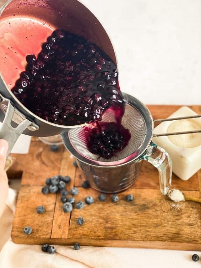 Blueberry Simple Syrup being poured