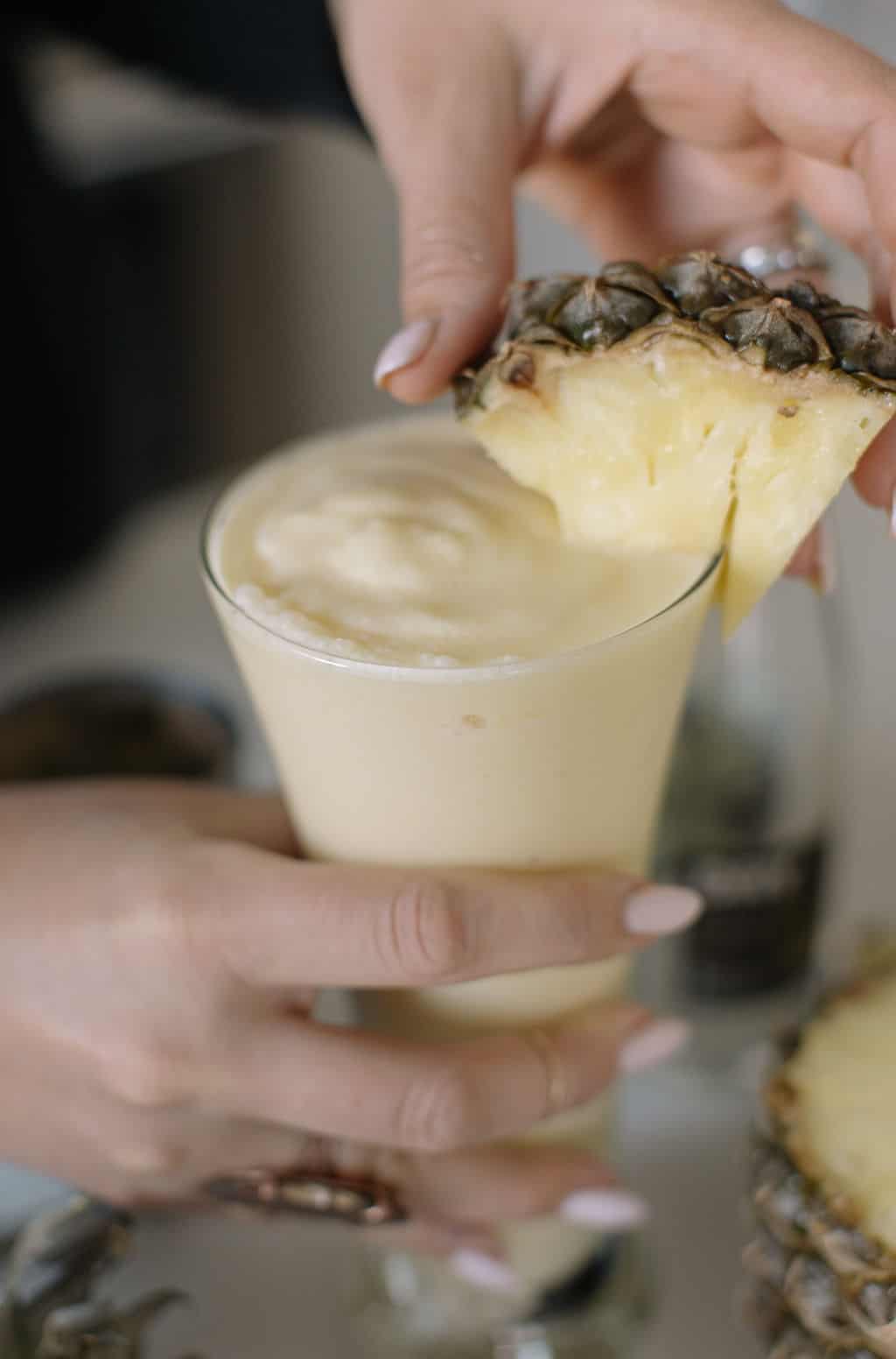 Non-alcoholic pina colada close up with pineapple triangle