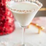candy cane christmas mocktails in a martini glass