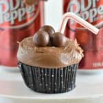 Dr Pepper Cupcakes in a black cupcake liner