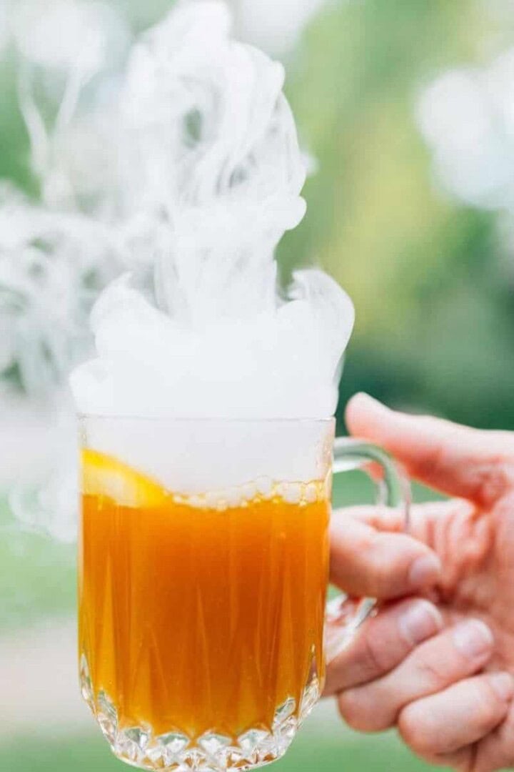 Smoking Halloween Mocktails in a hand