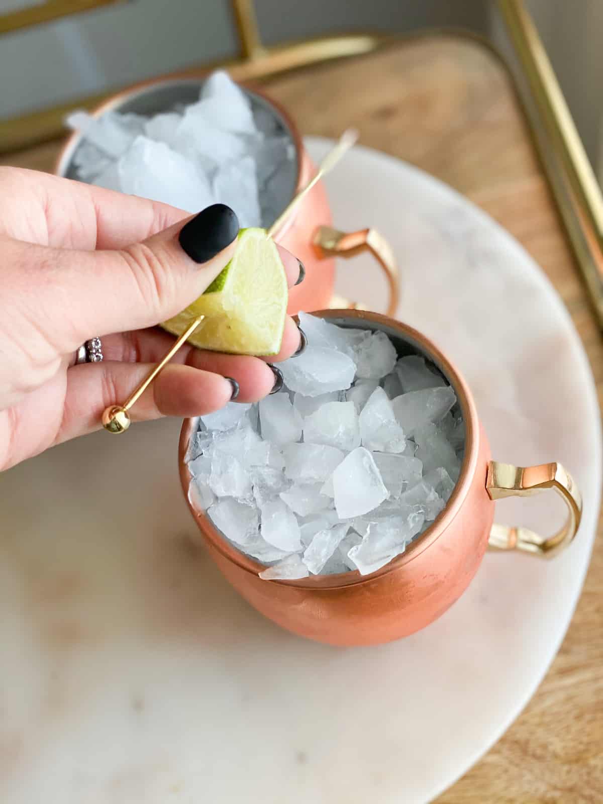 Lime in hand being squeezed