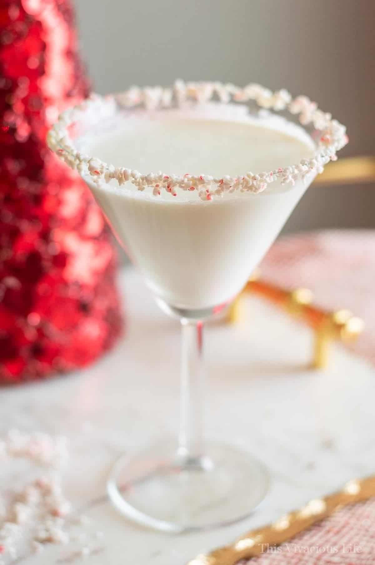 Our candy cane Christmas mocktails in a martini glass