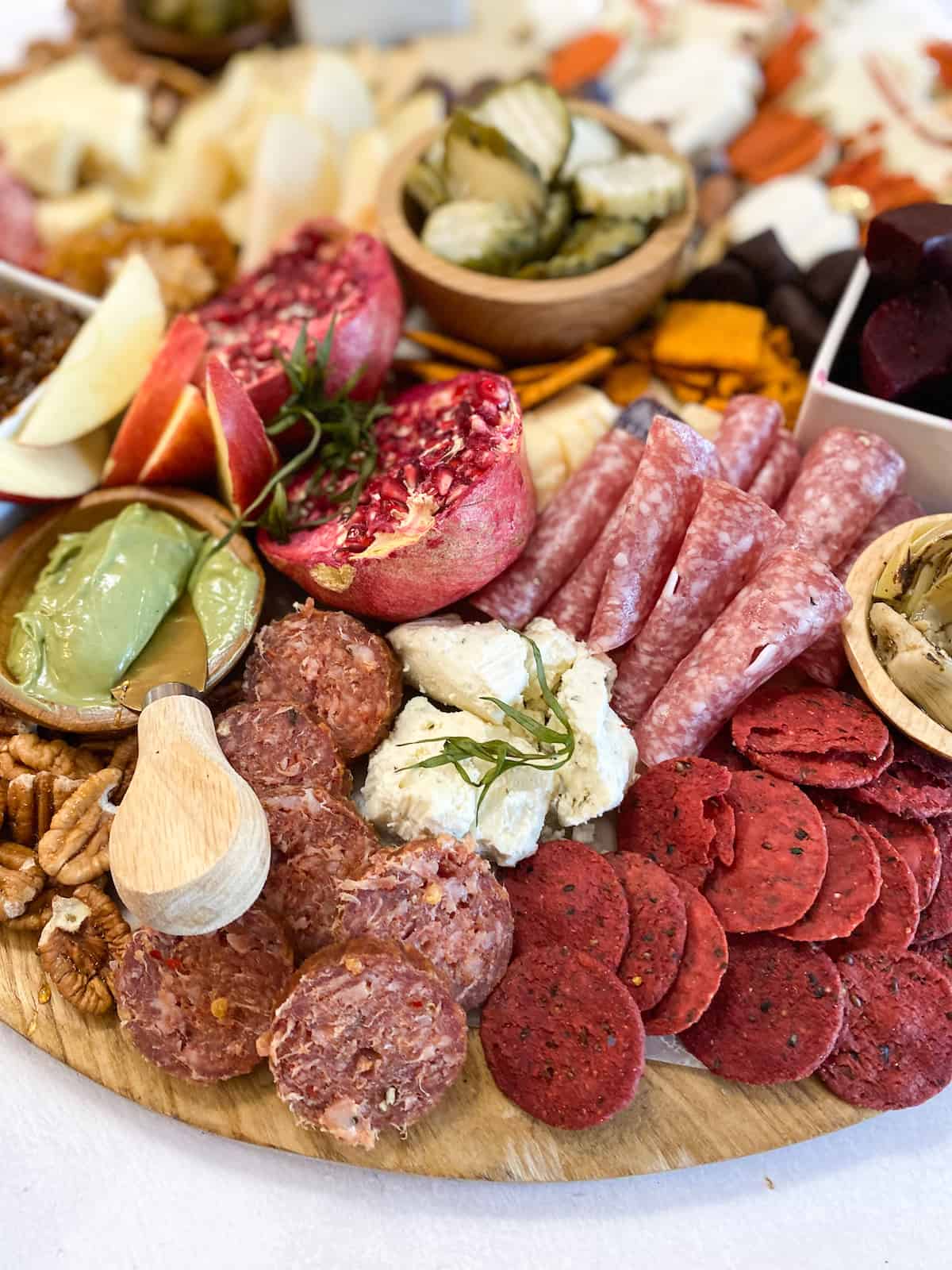 Thanksgiving charcuterie board items like meat, crackers and cheese
