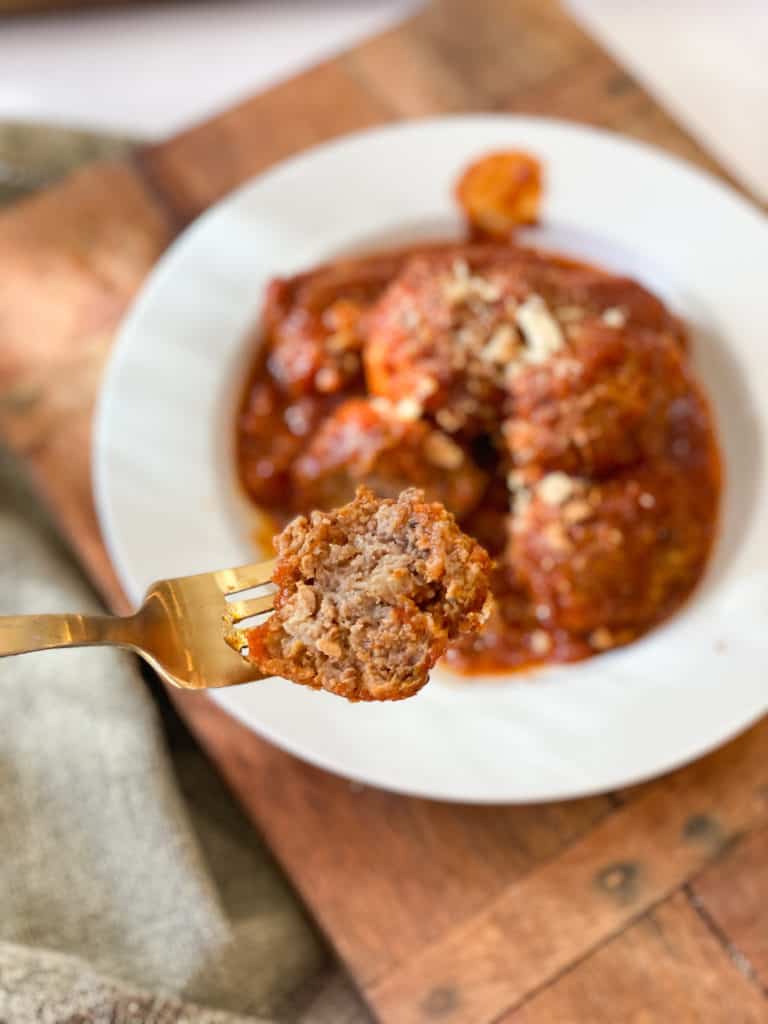 Instant Pot Meatballs on a fork cut in half