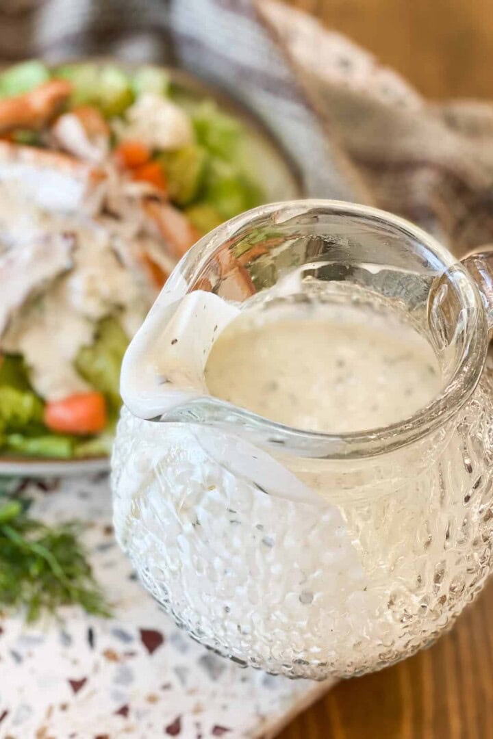 Whole30 Ranch Dressing in a glass pitcher