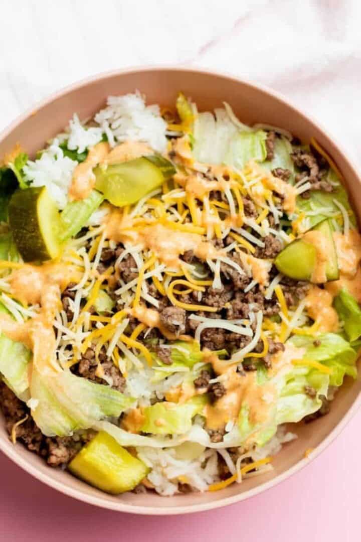 Big Mac bowl in a pink bowl with gold fork