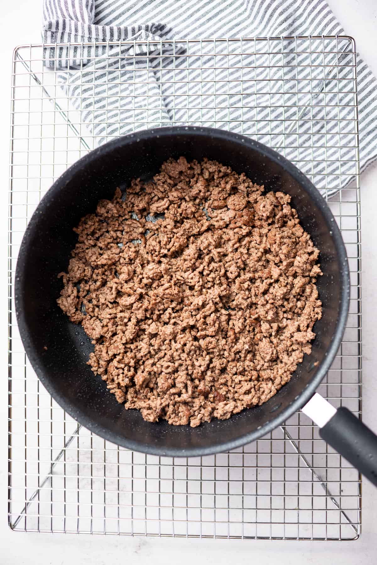 Ground beef in a black frying pan