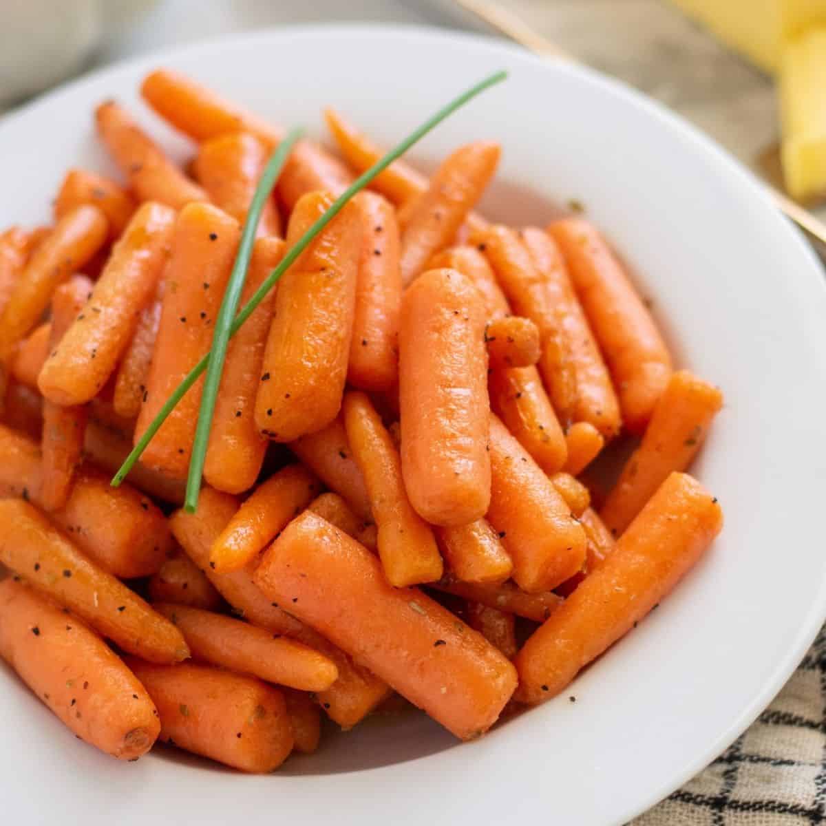 Instant pot carrots in a white bowl