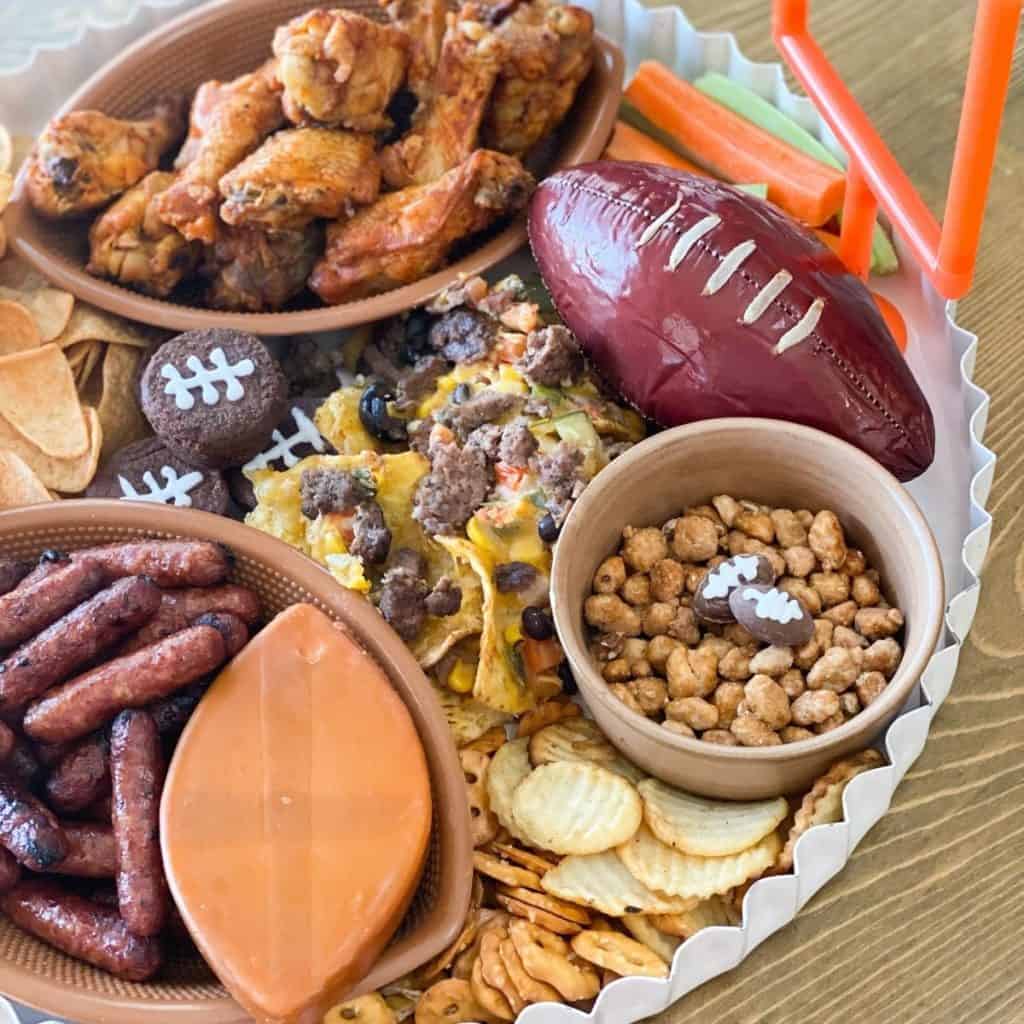 Super Bowl charcuterie board with football summer sausage and more