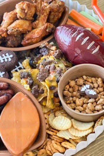 Super Bowl charcuterie board with football summer sausage and more