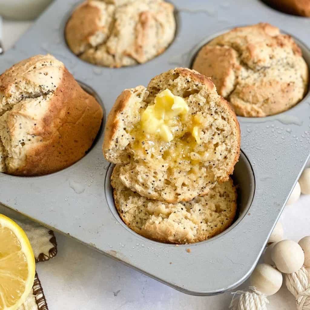 sourdough muffins in a muffin tin