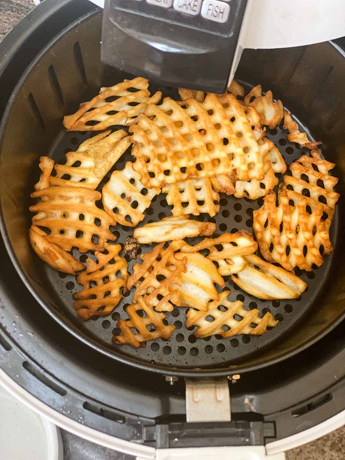 crispy air fryer waffle fries done