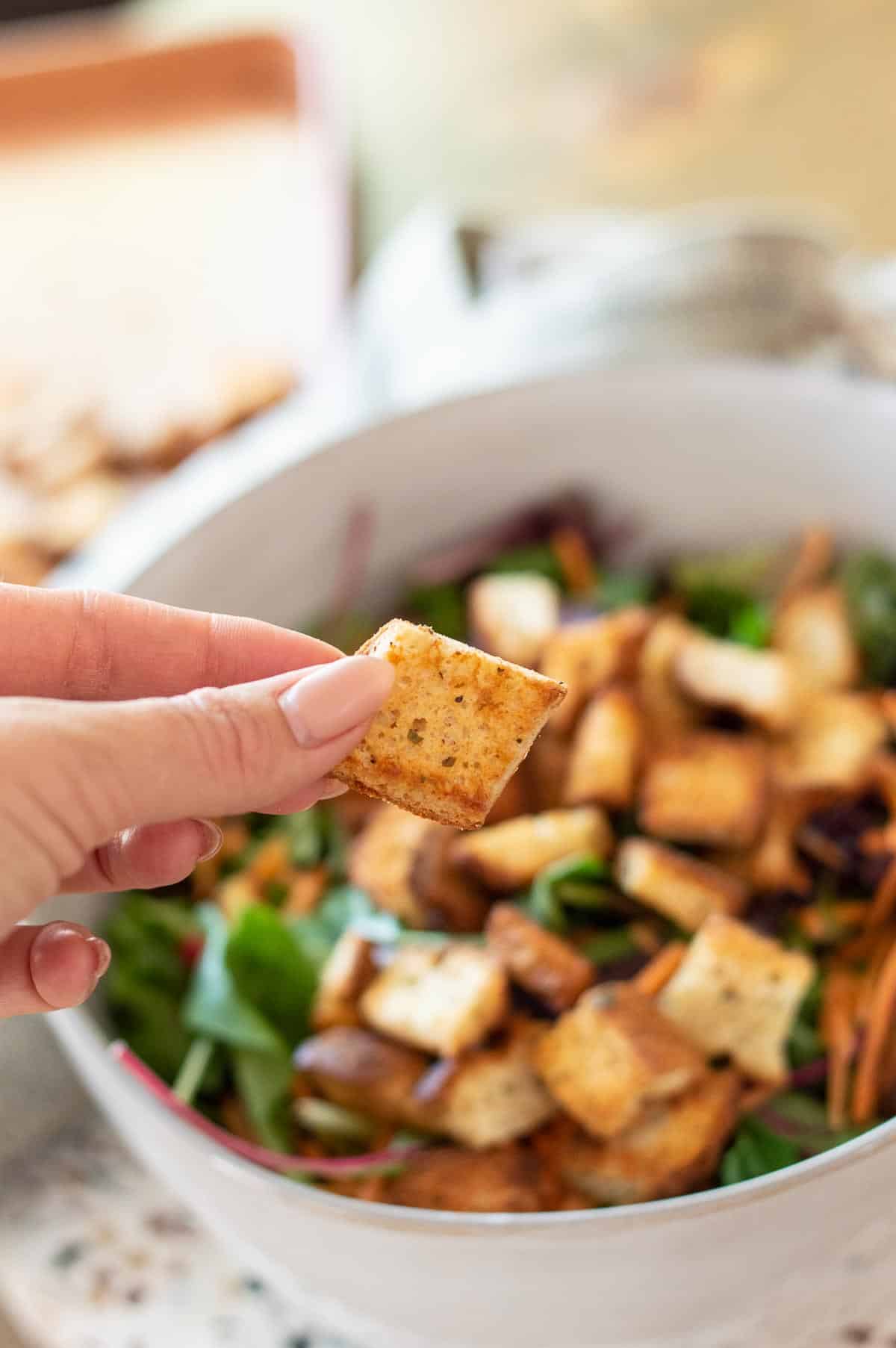 Gluten-Free Croutons in a hand