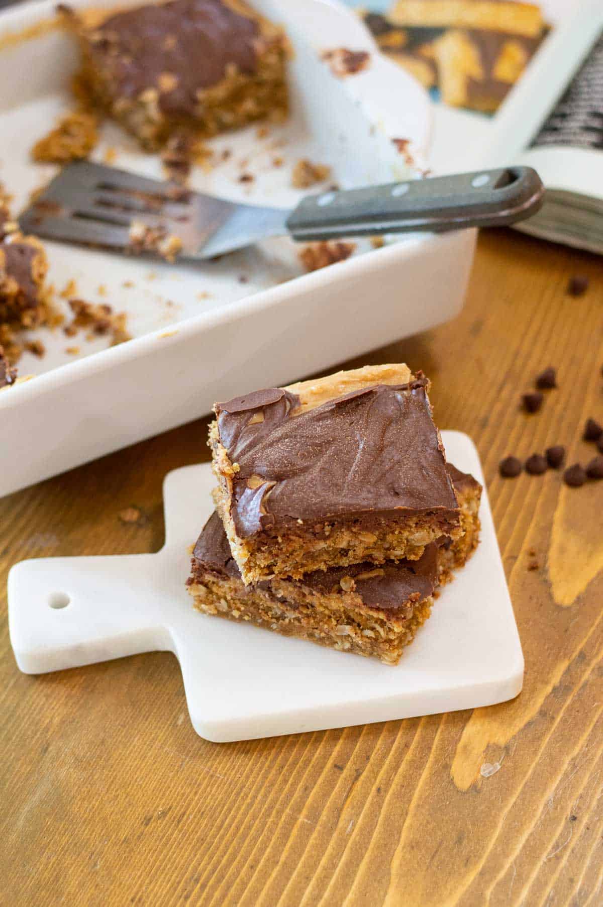 Gluten-Free Peanut Butter Bars on a white marble tray