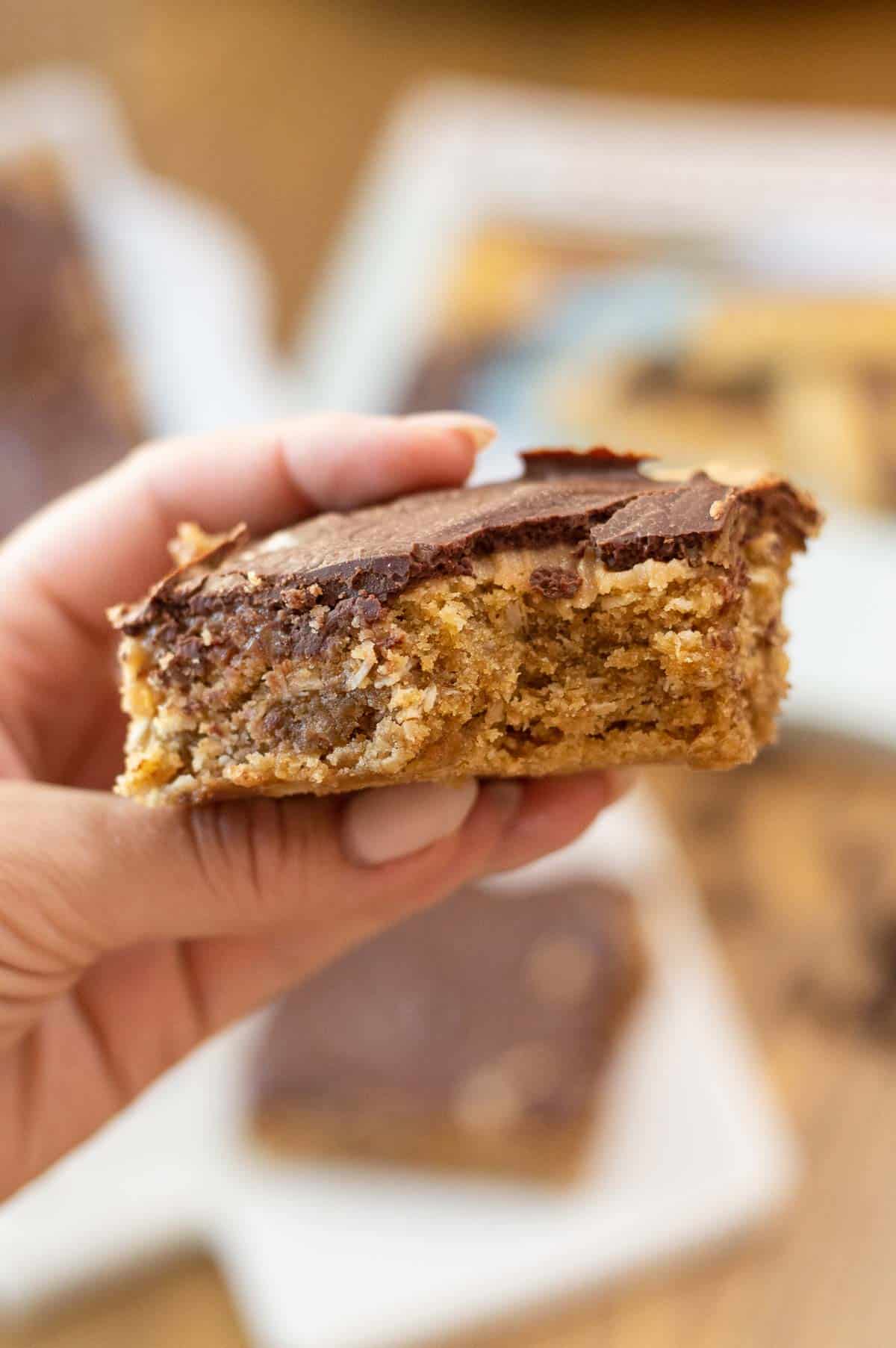 Gluten-Free Peanut Butter Bars in a hand