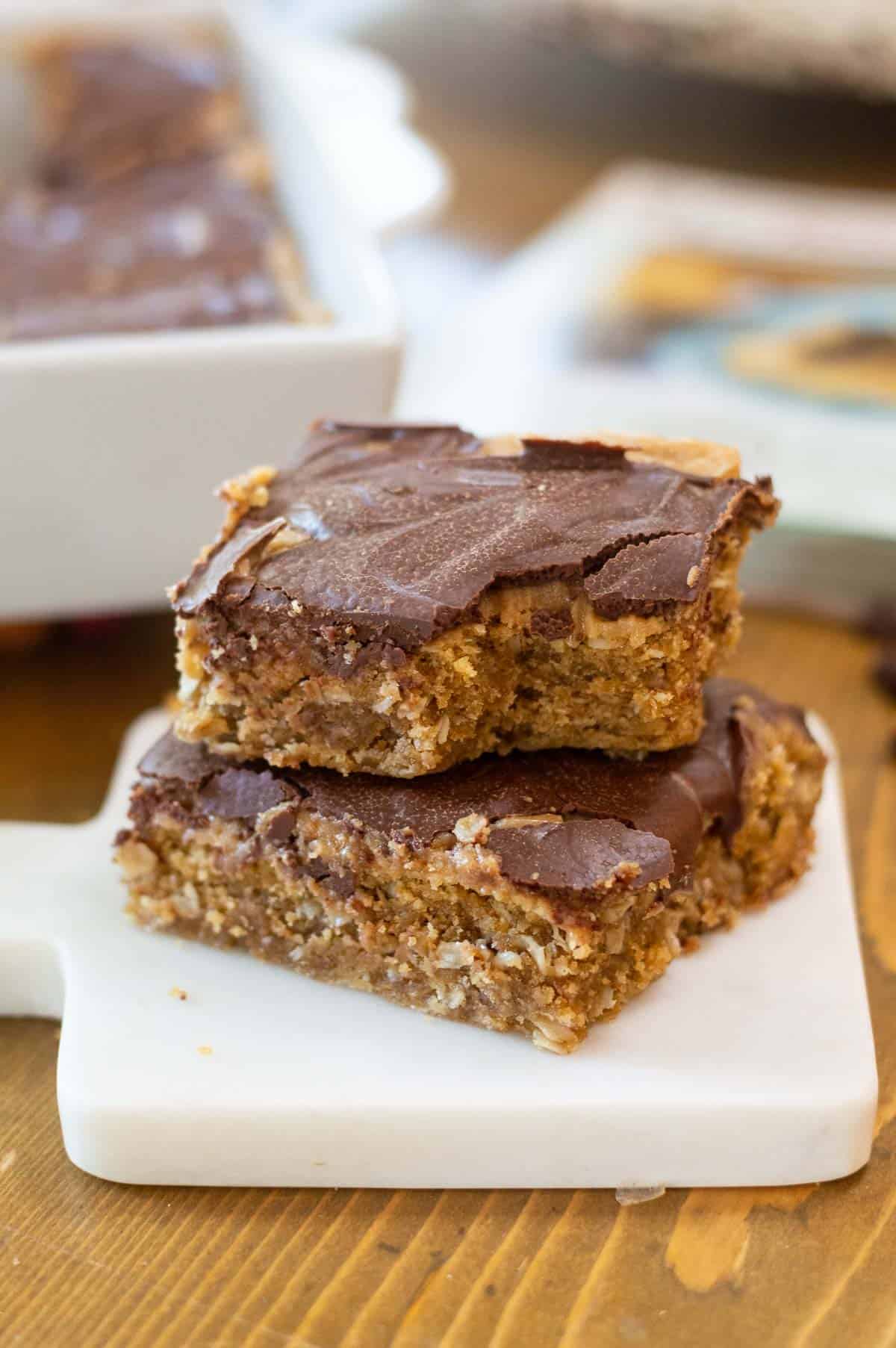 Gluten-Free Peanut Butter Bars on a white marble tray