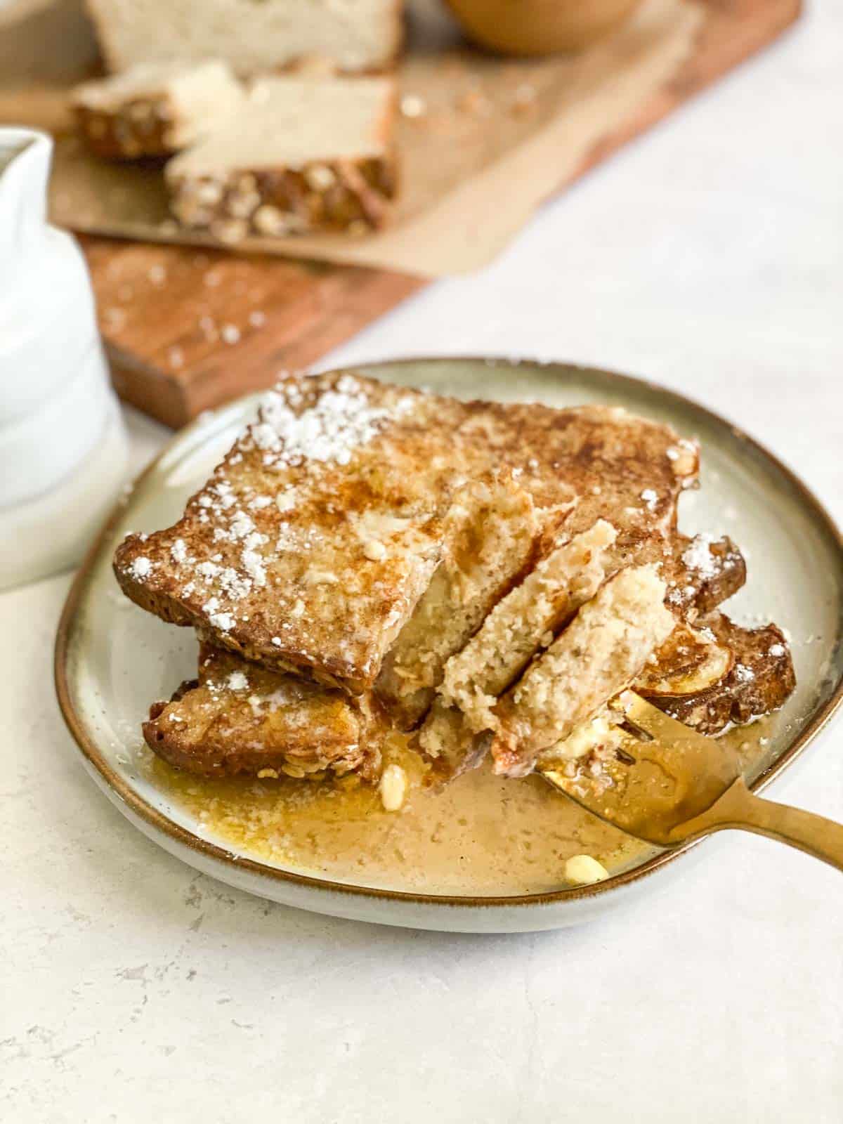 Sourdough French toast on a plate with fork