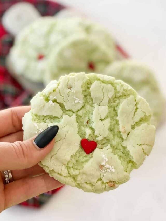 Grinch Cookies (4-Ingredients) in a hand