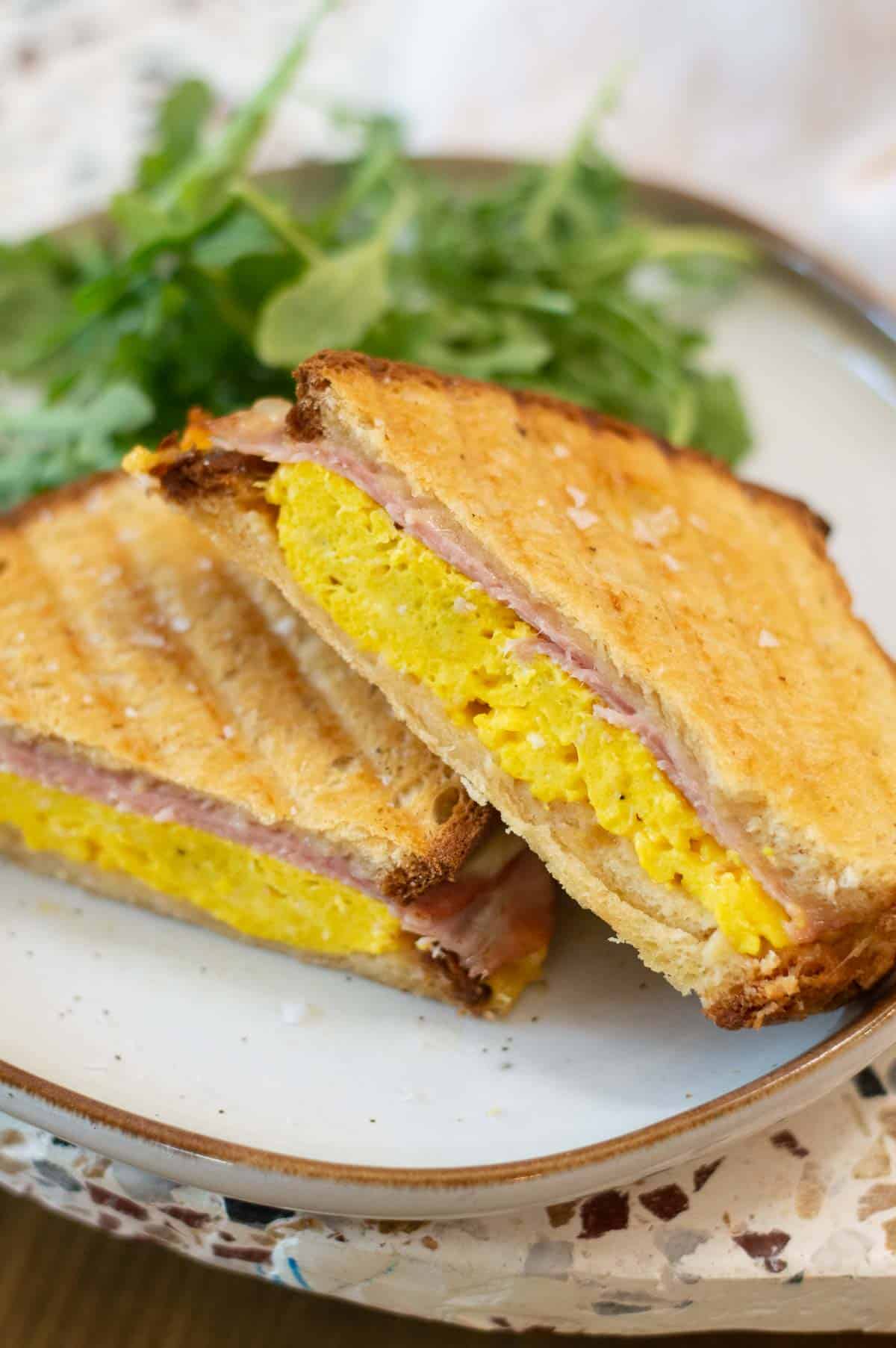This copycat Denny's Moons Over My Hammy recipe is filled with two delicious cheeses, classic ham, scrambled eggs, and sourdough bread. It is a great breakfast sandwich with a memorable name that will make you smile.