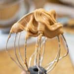 Peanut Butter Frosting in Minutes on a wire whisk