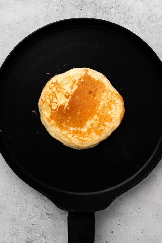 Gluten free pancake being cooked on a griddle