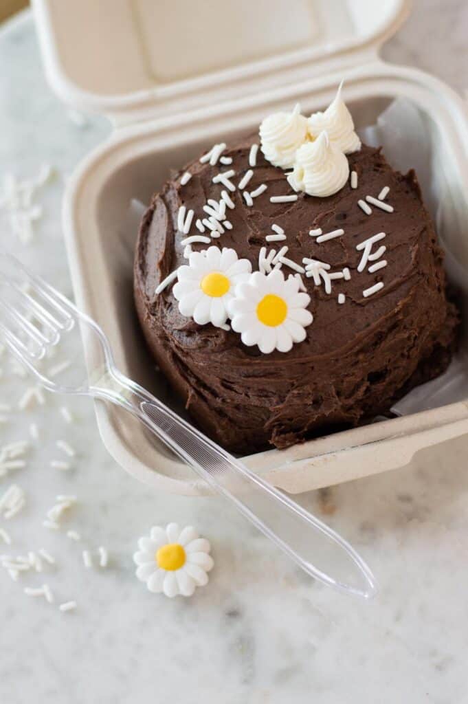 Bento Cake with chocolate frosting and sunflower candies