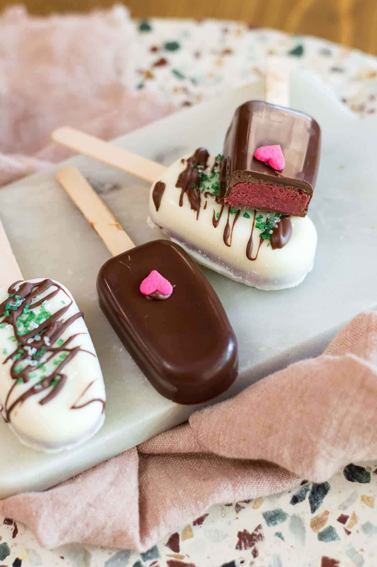 Cakesicles on a marble plate