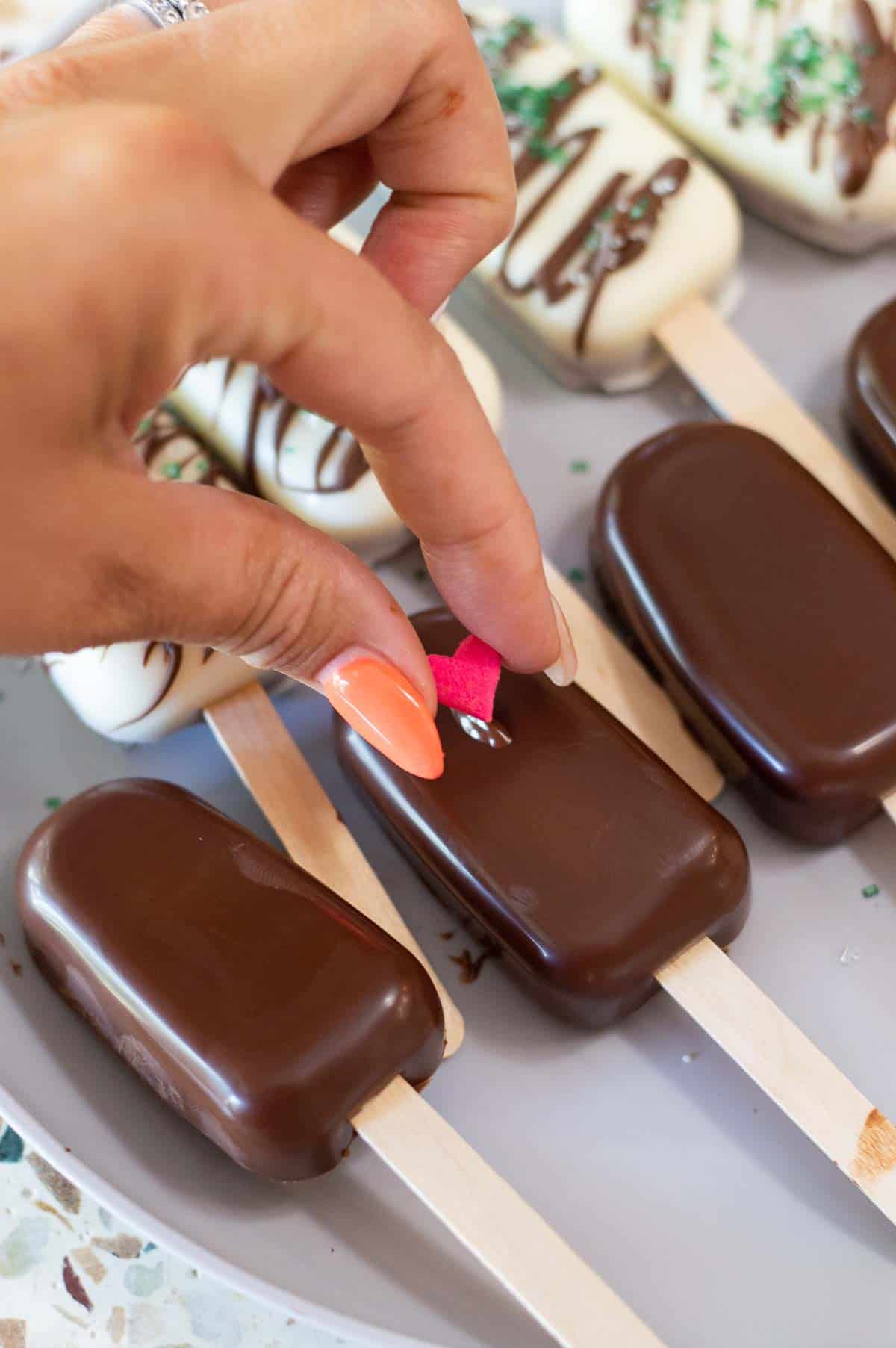 Cakesicles on a marble plate