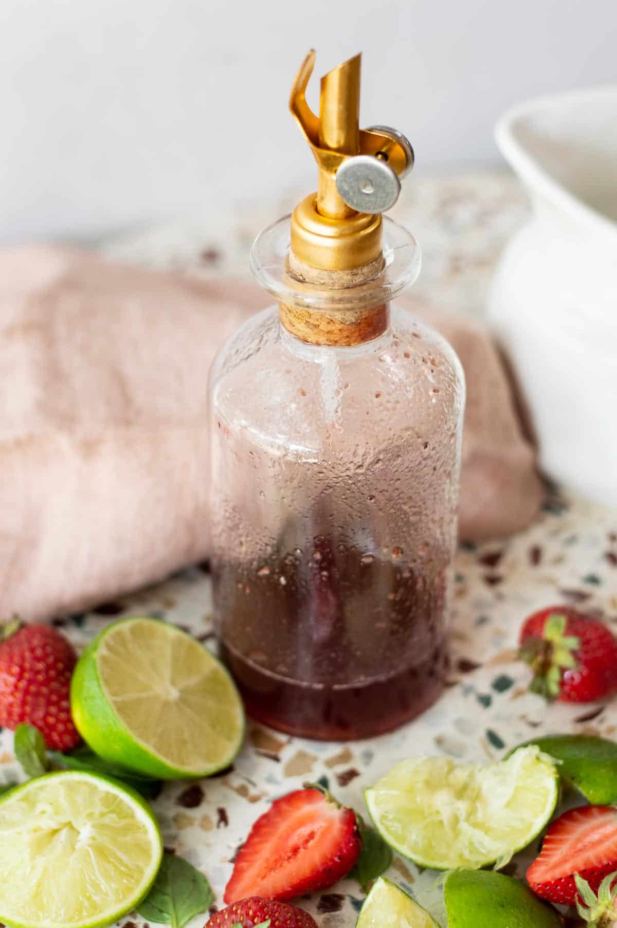 Strawberry Mojito Mocktail syrup in a glass bottle