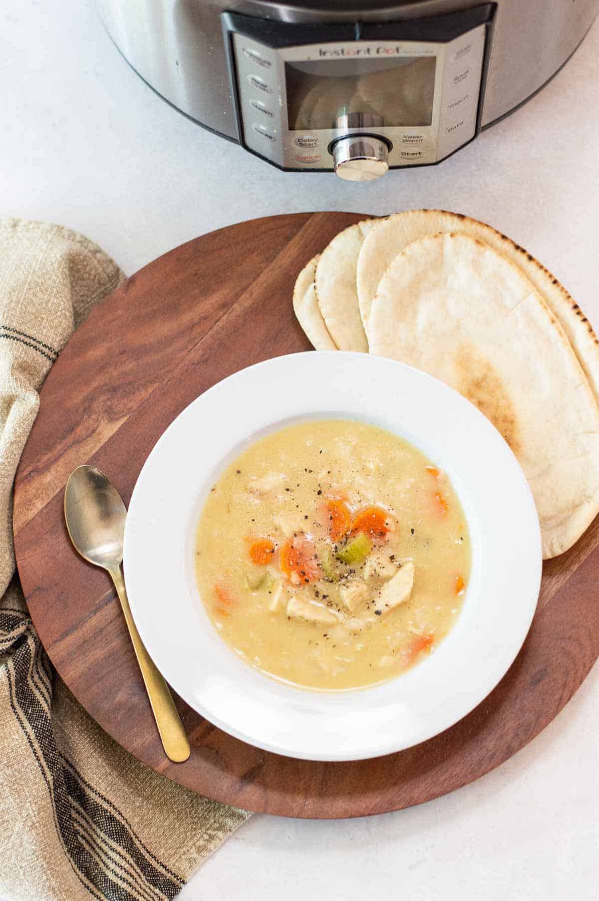 Instant Pot Chicken Noodle Soup in a white bowl