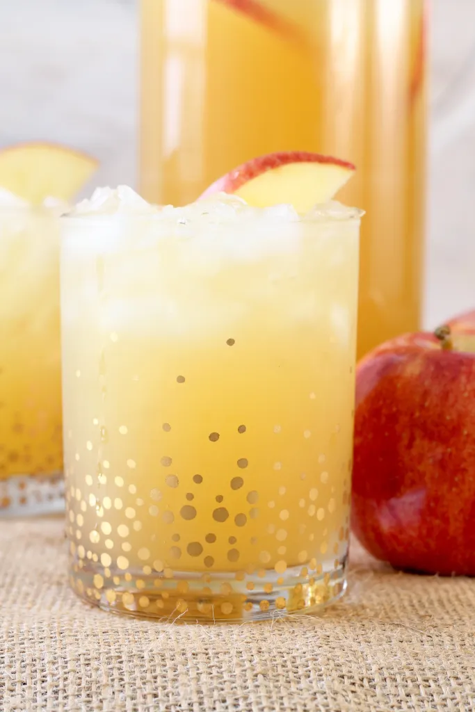 easy fall party punch in a gold bottomed glass