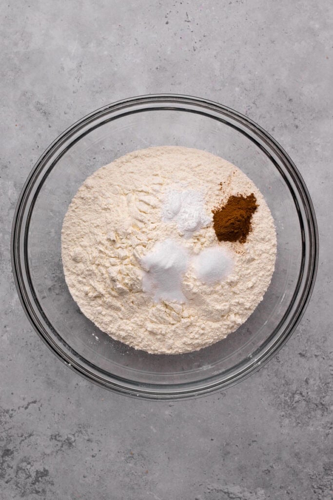 Gluten free apple fritter dry ingredients in a bowl ready to be mixed