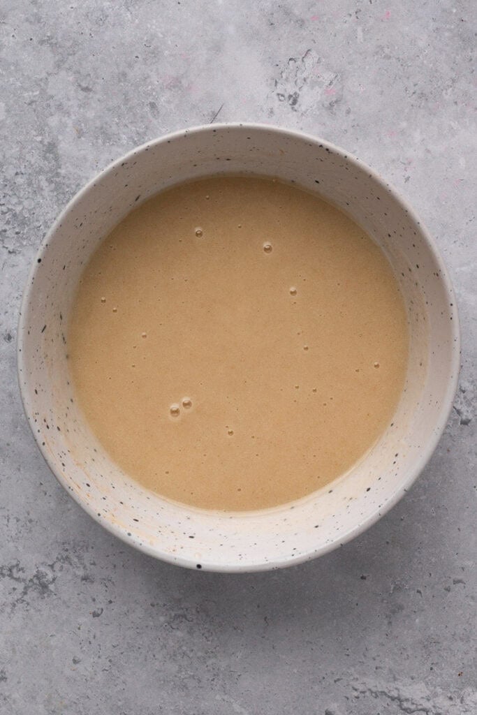 Glaze in a bowl for gluten free apple fritters