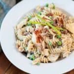 Instant Pot Chicken Pasta with Bacon and Ranch in a white bowl