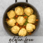 top down image of chicken and dumplings with large fluffy dumplings