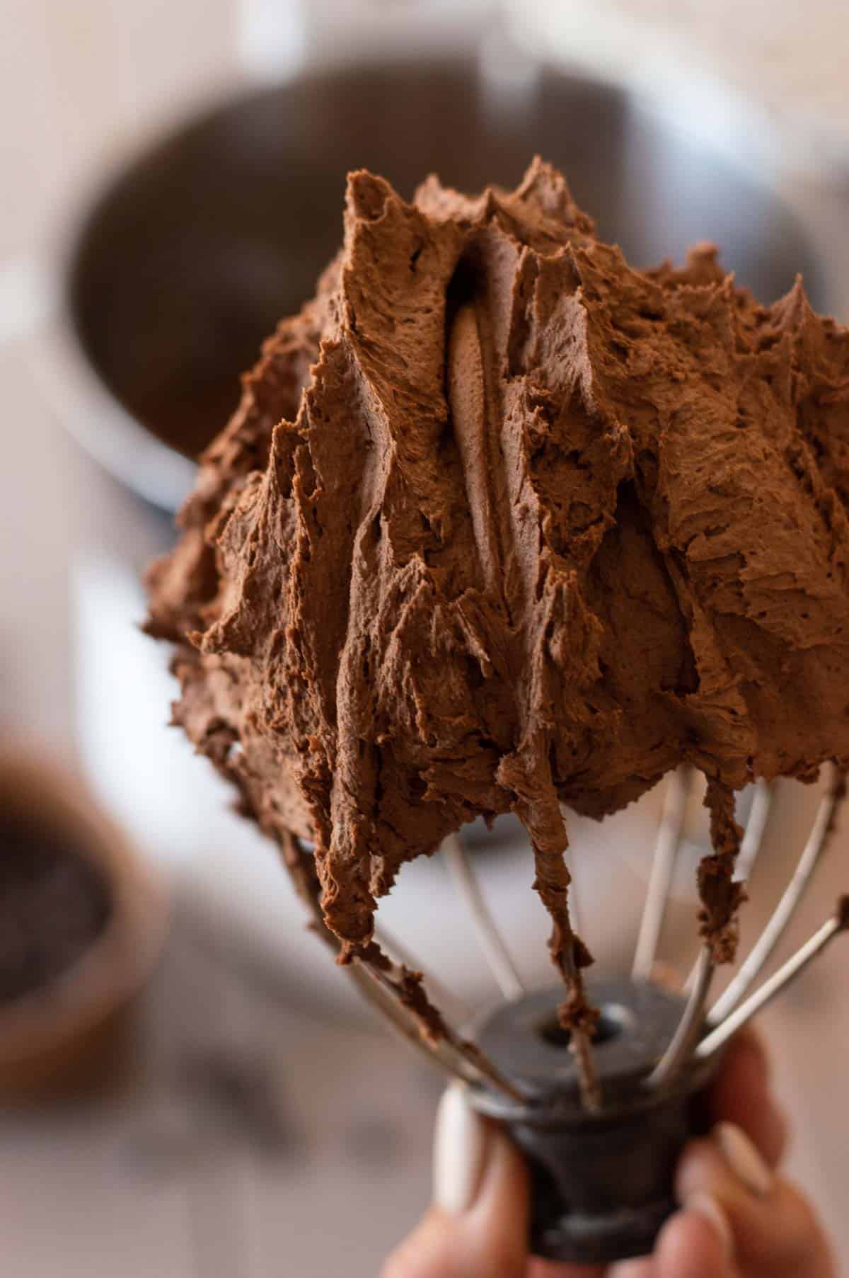 chocolate frosting on a whisk